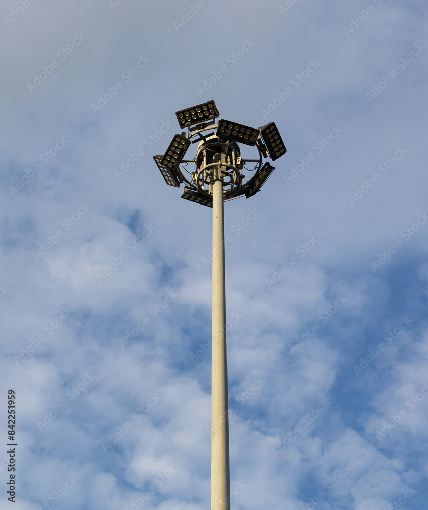 A large pillar of light illuminates the background of a bright sky. A large pillar of light illuminates the background of a bright sky.