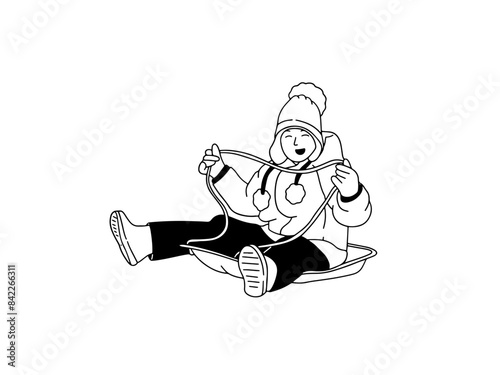Boy playing snow slide
