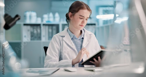 Wallpaper Mural Scientist, reading and woman with tablet in laboratory for medical research, microscope data or analysis. Healthcare, female employee at night with digital for biotechnology, future or scrolling Torontodigital.ca