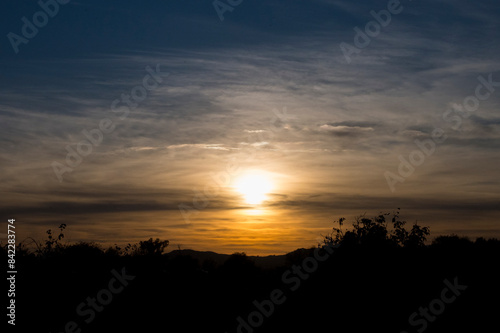 Sun Falling Through Clouds