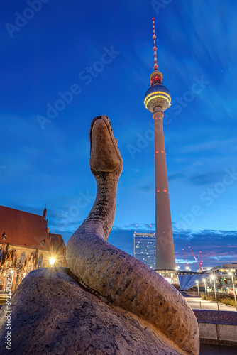 The TV Tower and part of the Neptune Fountain on Alexanderplatz in Berlin at dawn
