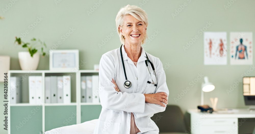 © HockleyMedia24/peopleimages.com - Hospital, crossed arms and portrait of mature doctor with stethoscope for medical career, support and health. Clinic, healthcare and professional woman for cardiology, pulmonary service and wellness © HockleyMedia24/peopleimages.com - Hospital, crossed arms and portrait of mature doctor with stethoscope for medical career, support and health. Clinic, healthcare and professional woman for cardiology, pulmonary service and wellness