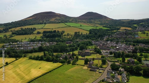 Aerial drone footage of a Scottish rural town – Melrose. Located in the  borders of Scotland and is home to the Scottish landmark Melrose Abbey photo