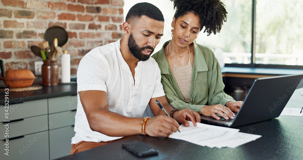 Couple, documents and laptop with budget in kitchen for mortgage loan, investment planning and writing. People, technology and finance paperwork in home with invoice for expenses, savings and taxes Couple, documents and laptop with budget in kitchen for mortgage loan, investment planning and writing. People, technology and finance paperwork in home with invoice for expenses, savings and taxes