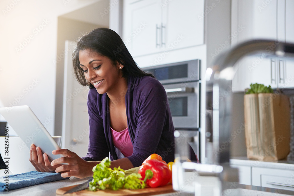 Recipe, vegetables and woman with tablet in kitchen for online, information and food website. Internet, female person and ingredient with tech at home for digital instructions, meal prep and learning Recipe, vegetables and woman with tablet in kitchen for online, information and food website. Internet, female person and ingredient with tech at home for digital instructions, meal prep and learning