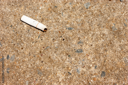 close up cigarette on cement floor, copy space for text, medical and healthcare, stop smoking, 31 may world no tobacco day concept