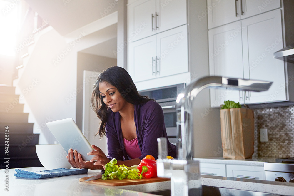 Vegetables, recipe and woman with tablet in kitchen for website, online information and meal prep. Internet, person and ingredient with tech at home for food, cooking and reading digital instructions Vegetables, recipe and woman with tablet in kitchen for website, online information and meal prep. Internet, person and ingredient with tech at home for food, cooking and reading digital instructions