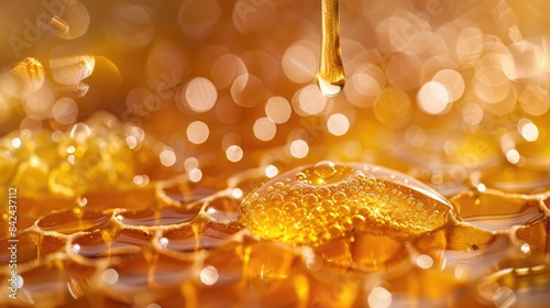 A description of bee honey dripping from honeycombs filled with golden nectar mainAxisAlignment