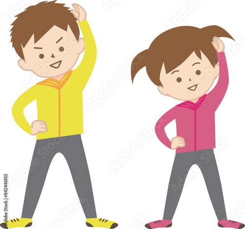 スポーツウェア姿で体操をする男の子と女の子