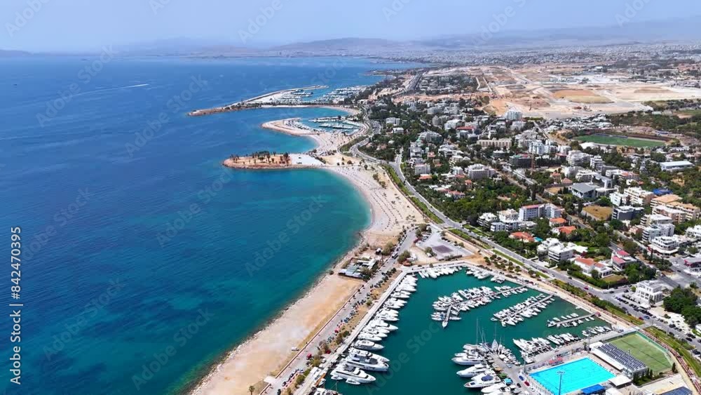 Aerial view of the popular Glyfada coast, south Athens suburb, Greece, with beaches, marinas and turquoise sea Aerial view of the popular Glyfada coast, south Athens suburb, Greece, with beaches, marinas and turquoise sea