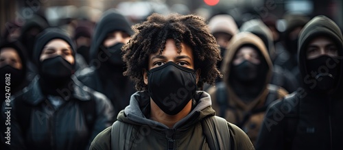 Protest for Black human rights in the USA featuring a woman wearing a mask with 'I Can't Breathe', seen in a copy space image. photo