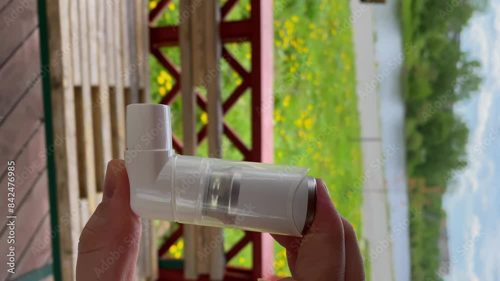 inhaler. inhaler in hand. gazebo in the park. Slow motion video. High quality 4K footage. inhaler. inhaler in hand. gazebo in the park. Slow motion video. High quality 4K footage.