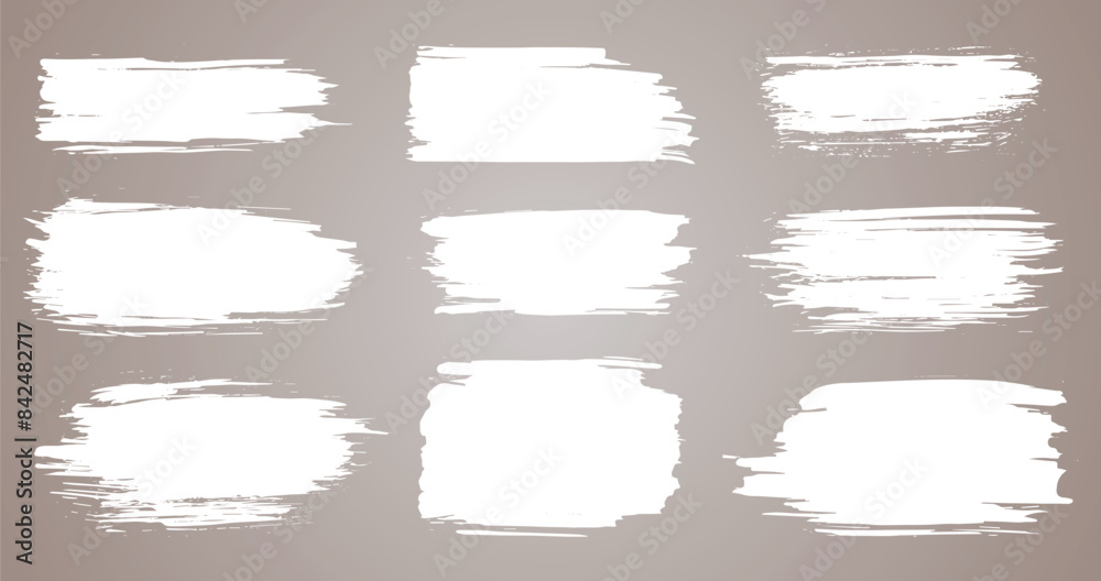 Paint brush. White ink grunge brush strokes. Vector paintbrush set. Grunge design elements. Painted ink stripes. Creative isolated spots. Ink smudge abstract shape stains and smear set Paint brush. White ink grunge brush strokes. Vector paintbrush set. Grunge design elements. Painted ink stripes. Creative isolated spots. Ink smudge abstract shape stains and smear set