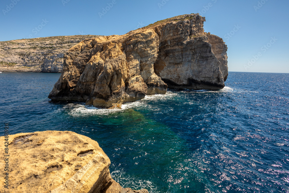 Tilt Rock Il, Viewpoint in Dwejra Bay, rock formation on the Mediterranean sea. Gozo island Malta. Tilt Rock Il, Viewpoint in Dwejra Bay, rock formation on the Mediterranean sea. Gozo island Malta.