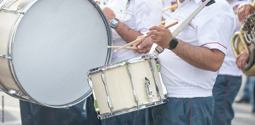Fototapeta premium Police force officers with a musical instruments in the city.