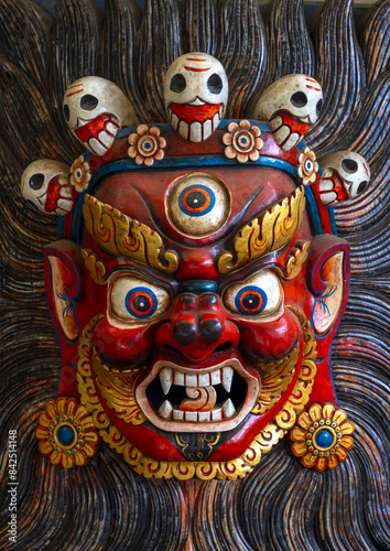Head of Bhairava mask with its five skulls, Trongsa District, Trongsa, Bhutan photo