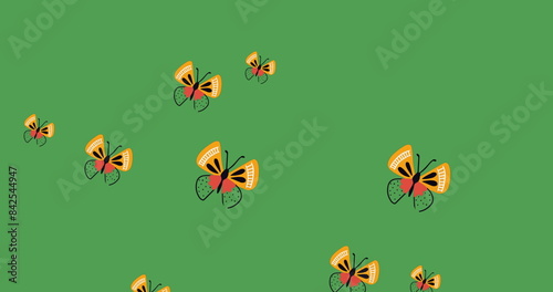 Image of butterflies over tree on green background