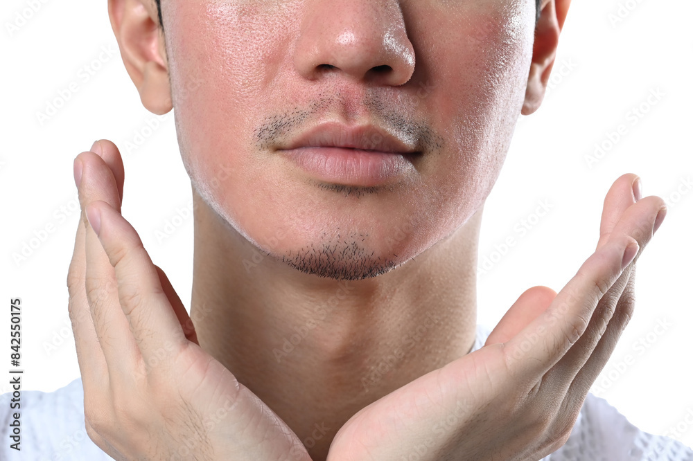Man touching his face examining complexion after laser skin resurfacing isolated over white background Man touching his face examining complexion after laser skin resurfacing isolated over white background