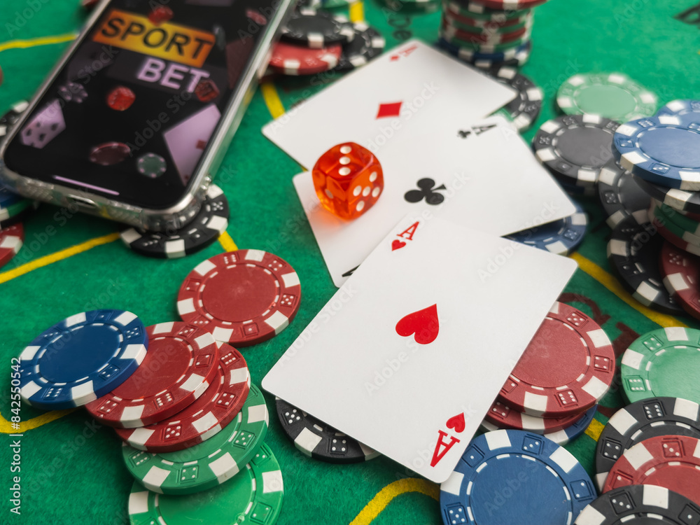 Fototapeta premium Online Poker casino banner with a mobile phone, chips, playing cards and dice. Marketing Luxury Banner Jackpot Online Casino with New model Smartphone. Empty advertising poster.