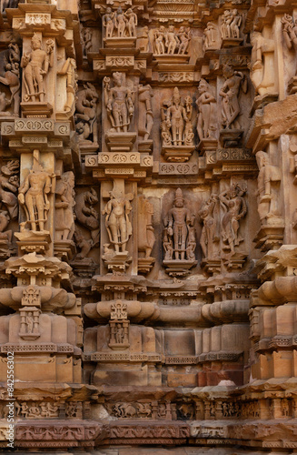 Beautiful Sculptures and carved on the wall of Chitragupta Temple in the Khajuraho temple complex  India