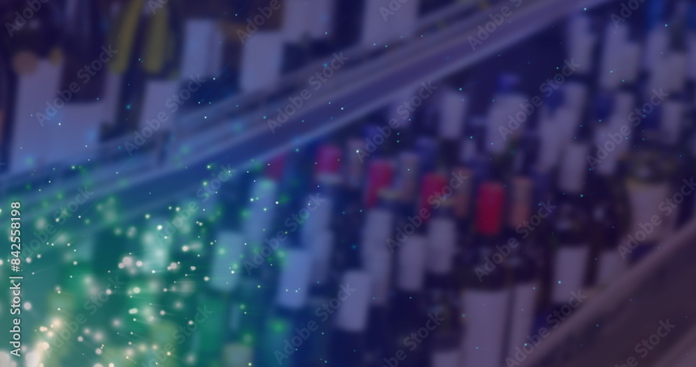 Image of lights over blurred alcohol shop in blue Image of lights over blurred alcohol shop in blue