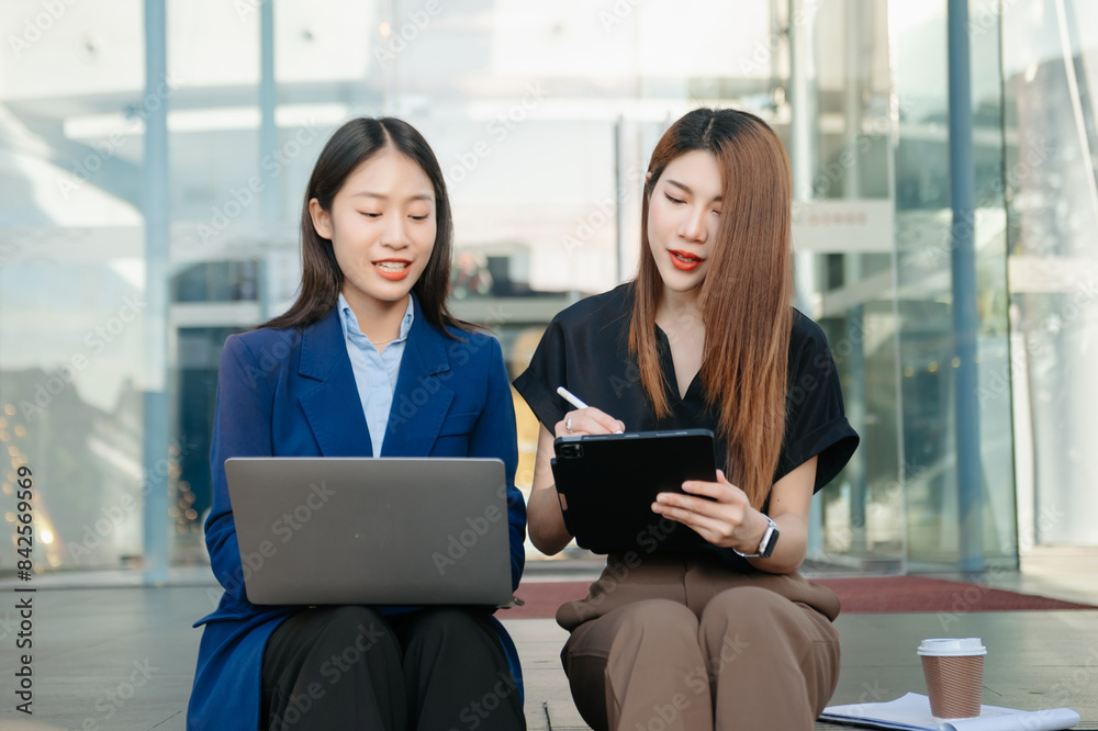 Young Asian business team creative businesspeople coworker, teamwork celebrating achievement and in planning design Young Asian business team creative businesspeople coworker, teamwork celebrating achievement and in planning design