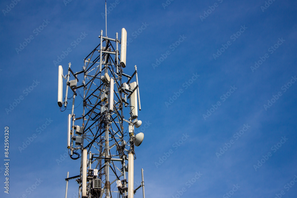 Telecommunication tower is a wireless communication technology in big cities on background sky Telecommunication tower is a wireless communication technology in big cities on background sky