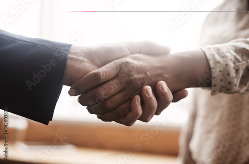 Office, hand shake and business people with agreement for teamwork, partnership and networking. B2b, hr deal and professional employee with thank you, welcome and support in cooperation in workplace