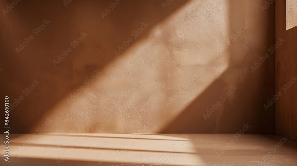 A brown wall and floor with light coming from the side. Background for product photography A brown wall and floor with light coming from the side. Background for product photography