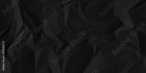 Black crumpled paper texture . wrinkled paper texture. Crumpled and top view textures can be used for background of text or any contents .