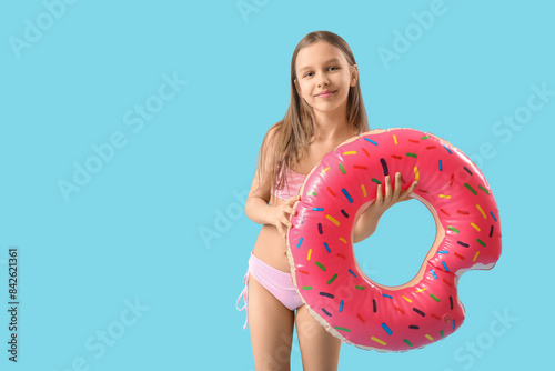 Cute little girl in swimsui...