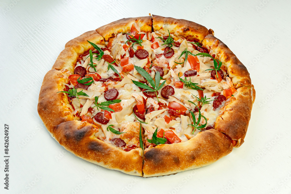 Homemade pizza with marijuana or cannabis leaves. Fresh medical marijuana, cannabis decorate on pizza. close-up, macro, Homemade pizza with marijuana or cannabis leaves. Fresh medical marijuana, cannabis decorate on pizza. close-up, macro,