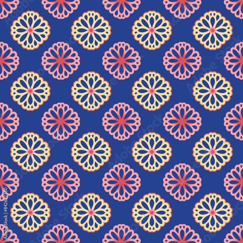 Yellow and pink flowers seamless pattern with blue background.