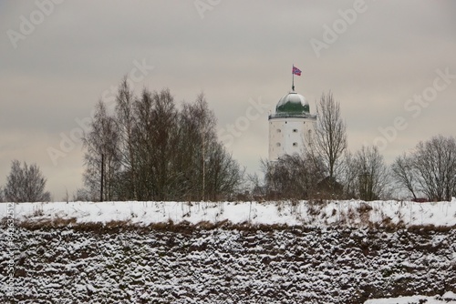 Vyborg, Russia, January 6, 2021. View of St. Olaf's Tower from behind an earthen rampart.