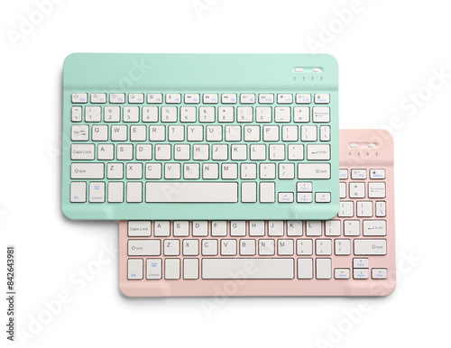 Modern wireless keyboards isolated on white background