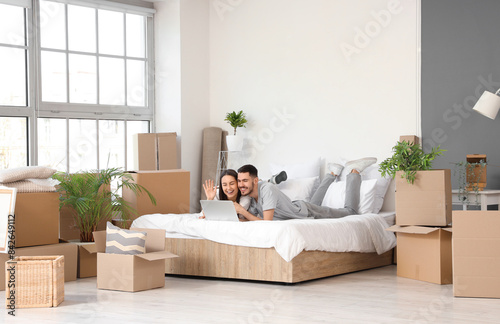 Young couple with laptop vi...