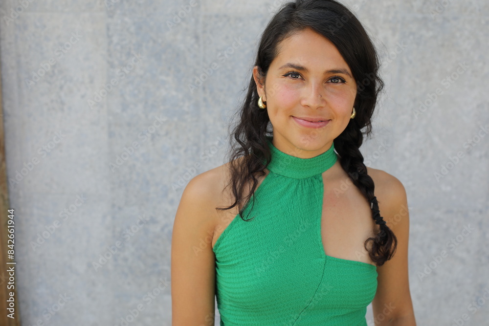 Beautiful Hispanic woman posing in studio with copy space Beautiful Hispanic woman posing in studio with copy space