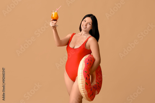 Beautiful young woman in st...