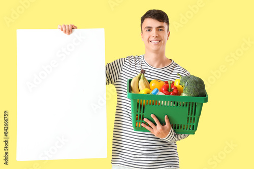 Young man with full shoppin...