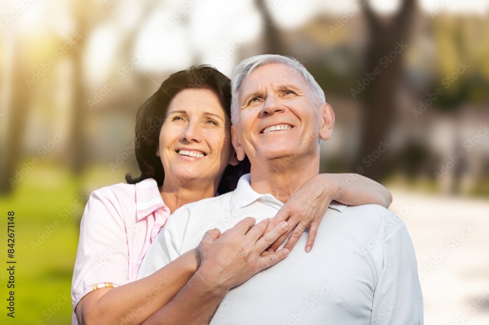 Fototapeta premium Cardio training. Happy old couple at morning in park