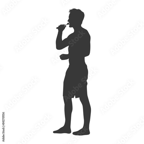 Silhouette of a man brushing his teeth, healthy morning routine.