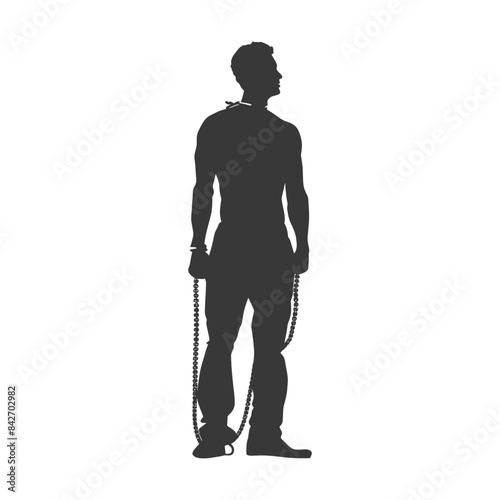 Silhouetted Man in Chains: Facing Freedom, Burdened Past.