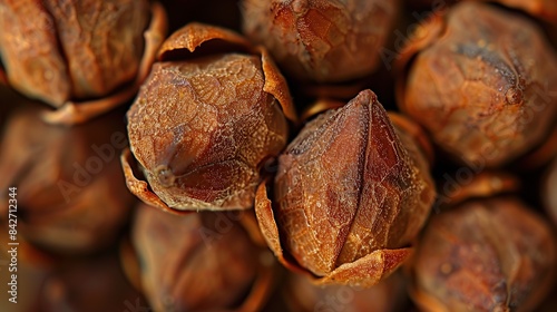 Clove buds captured in extreme closeup, revealing their rough texture and rich, brown. Generative Ai photo