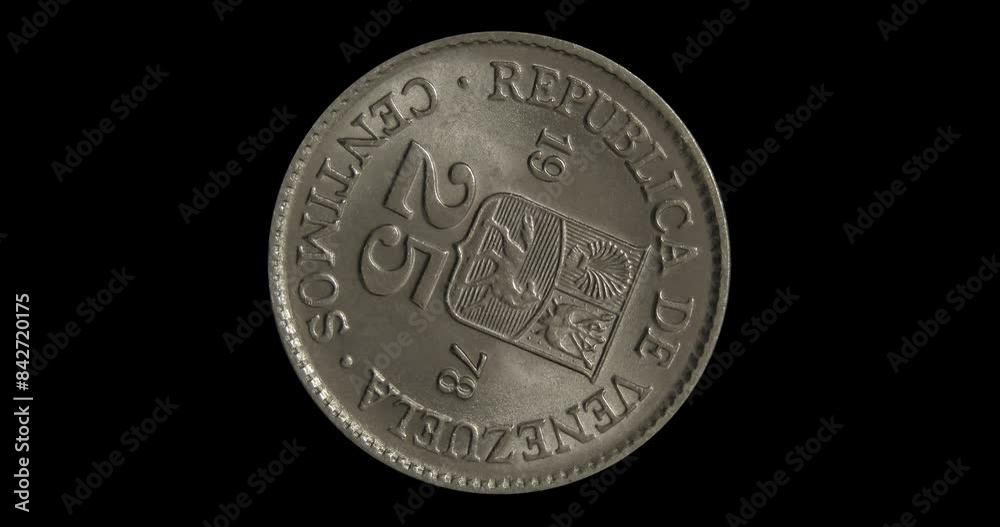 Reverse of Venezuela coin 25 centavos 1978, isolated in black background. Seamless animation in 4k resolution video. Reverse of Venezuela coin 25 centavos 1978, isolated in black background. Seamless animation in 4k resolution video.