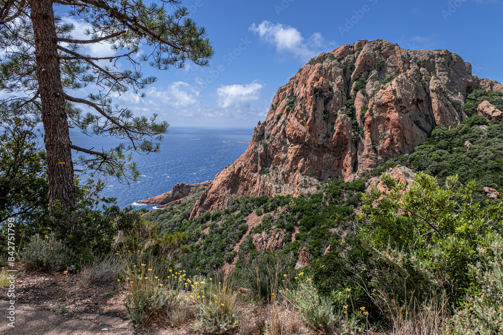 Massif de l'Esterel, a volcanic mountain range on the Mediterranean Sea coast on the French Riviera, located near Cannes on the east and Saint-Rafael on the west, France Massif de l'Esterel, a volcanic mountain range on the Mediterranean Sea coast on the French Riviera, located near Cannes on the east and Saint-Rafael on the west, France
