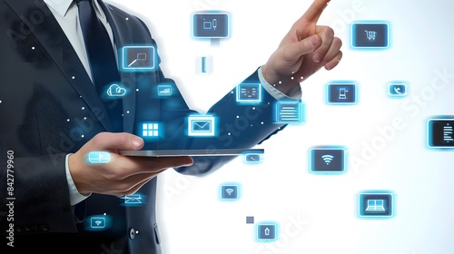 A person in a suit using a tablet with floating digital icons, illustrating technology integration in business.