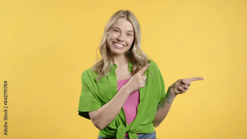 Recommending smiling woman pointing at right side, copy space or advertising. Recommending smiling woman pointing at right side, copy space or advertising.