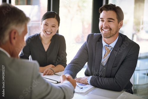 Obraz na płótnie Business people, handshake and meeting success with agreement, onboarding or hiring in corporate office