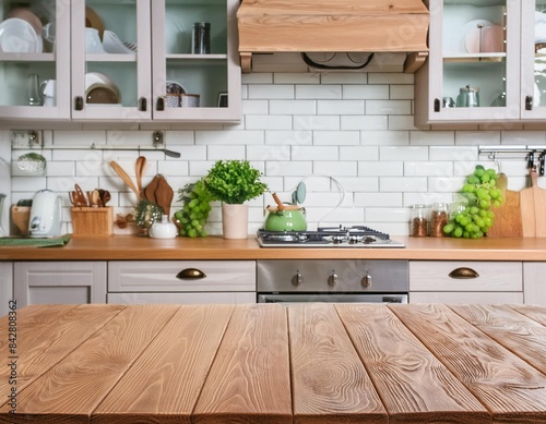 Beautiful natural wooden table with kitchen background