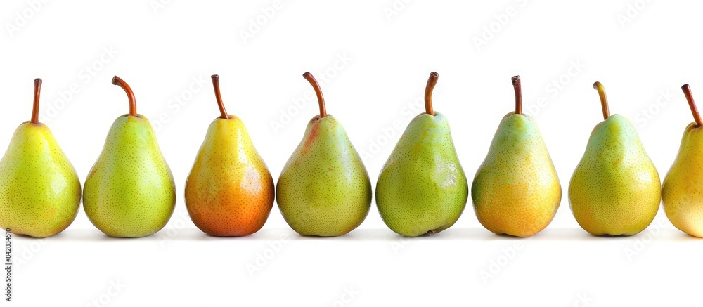 Isolated green pears: A vibrant display of one and a half ripe pears set against a white backdrop with a clipping path. Isolated green pears: A vibrant display of one and a half ripe pears set against a white backdrop with a clipping path.